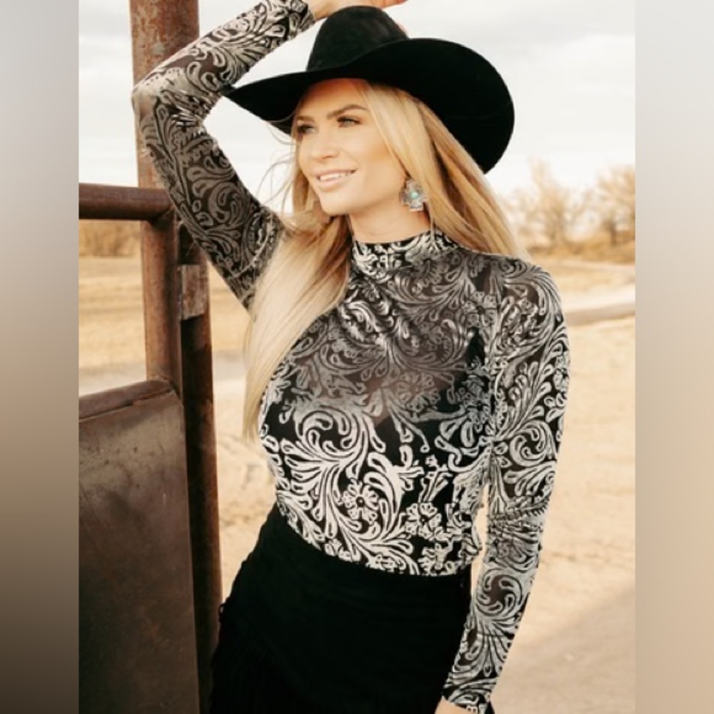 Mesh black long sleeve shirt features a shimmery silver velvet print